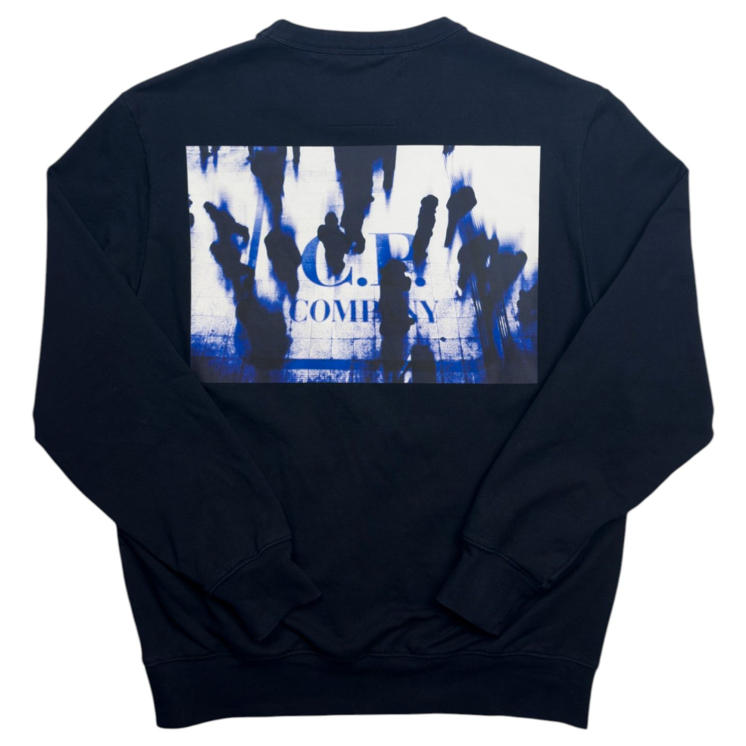 A navy blue crewneck sweatshirt with a large rectangular graphic print on the back. The graphic features a white background with blue paint splatters and black silhouettes of figures, with the text 'C.