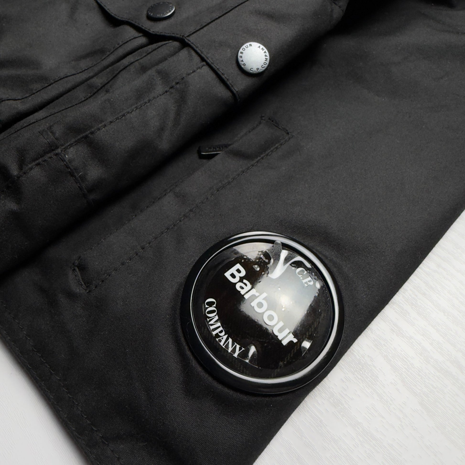 A/W 23 C.P. Company x Barbour Wax Cotton Creel 500 Mille Goggle Jacket - Black