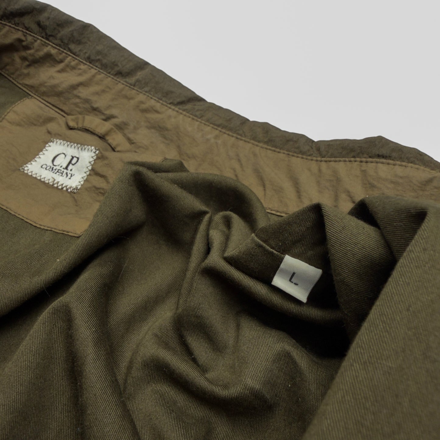 A/W 20 C.P. Company M.T.t.N. Lens Overshirt - Dark Olive